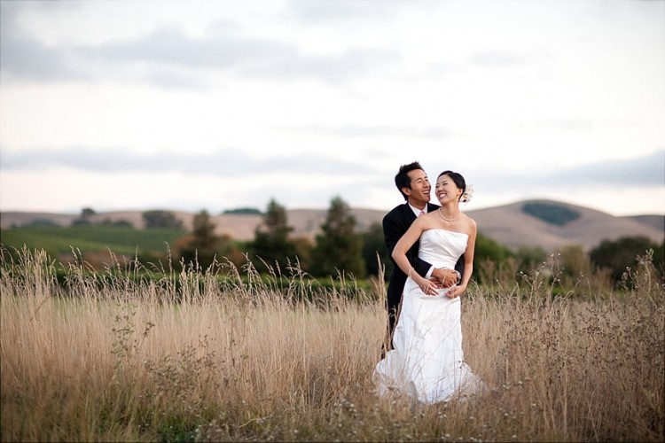 Bride and Groom Shot in the Field, Wedding Makeup and Hair by Triple Twist